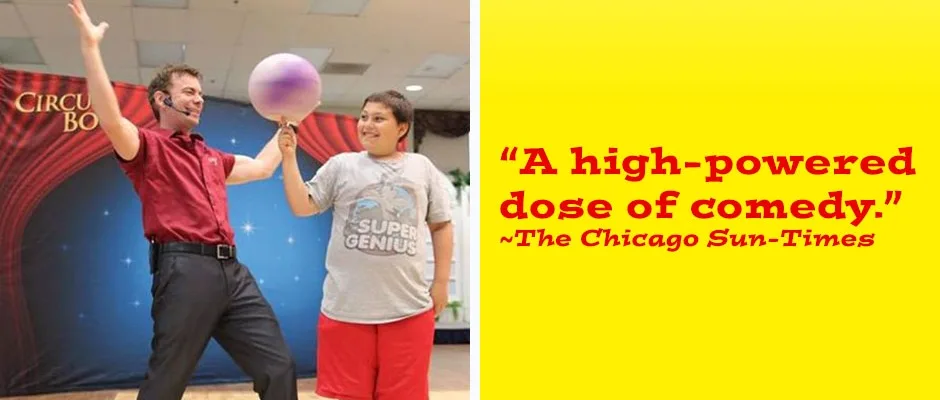 Circus Boy performing comedy with a young audience volunteer